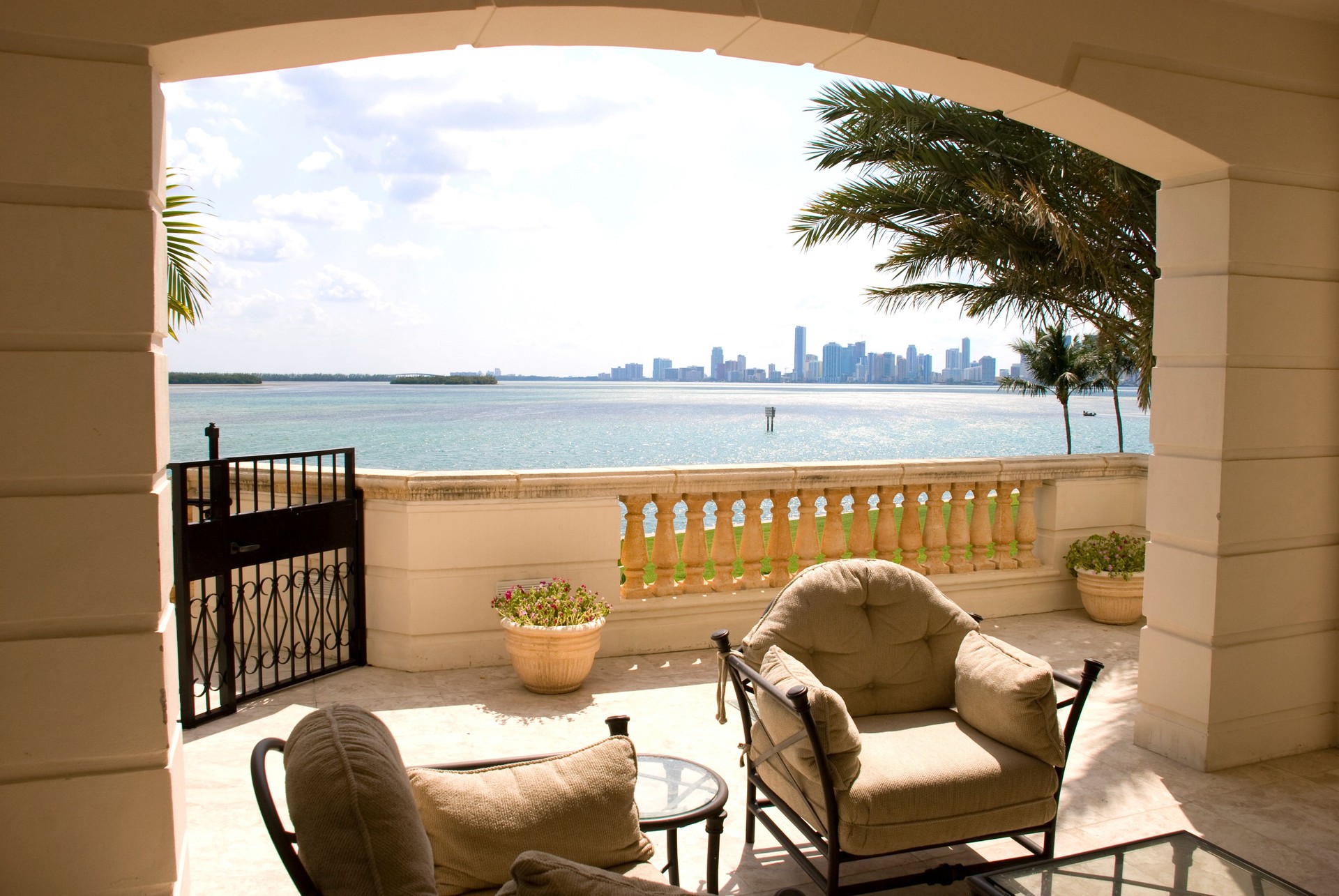 Luxury Condo Balcony Looking Across Bay To Miami Skyline